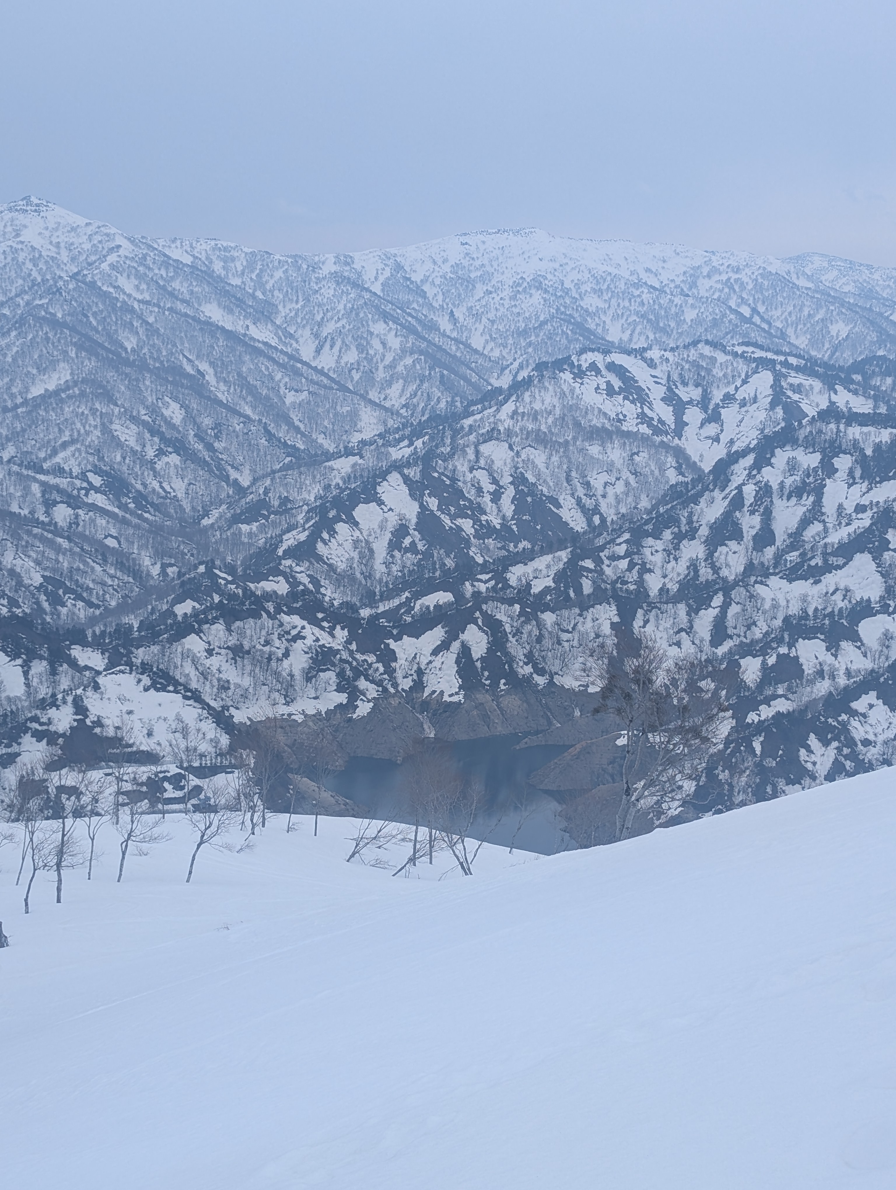 The Okutadami dam and mountain scenery in spring